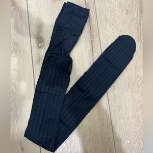 Black patterned footed tights small